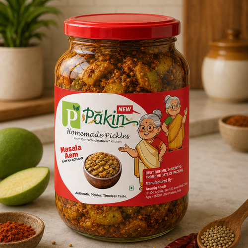 Jar of Pakin Homemade Pickles with a red lid on a table with ingredients and a plant in the background.